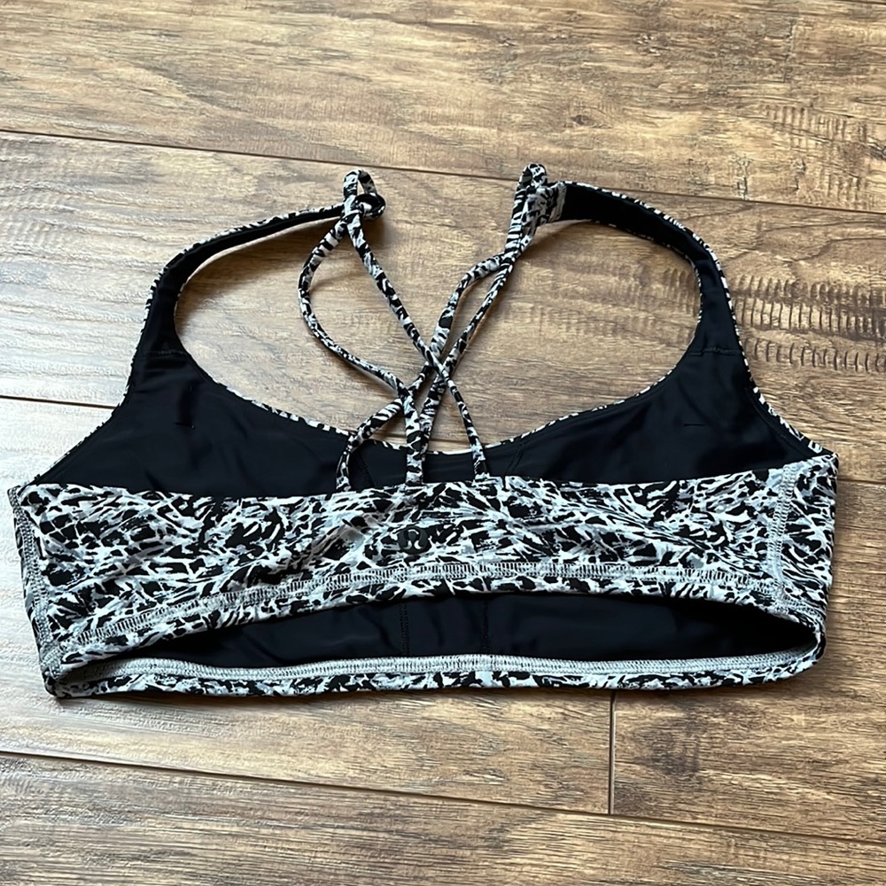Lululemon black, white and grey criss cross sports bra